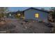 Single-story home with a patio and fire pit area in the backyard at 15612 S Tuthill Rd, Buckeye, AZ 85326