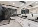 Modern bathroom with walk-in shower, soaking tub, and dual vanities at 15612 S Tuthill Rd, Buckeye, AZ 85326