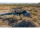 Desert home with desert landscaping and a view of mountains in the distance at 15612 S Tuthill Rd, Buckeye, AZ 85326