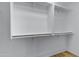 Walk-in closet with built-in shelving and a hanging rod for optimal organization at 16619 W Cottonwood St, Surprise, AZ 85388