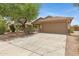 Single-Gathering home featuring a well-maintained yard and two-car garage at 16619 W Cottonwood St, Surprise, AZ 85388