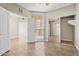 Open bedroom with closet, ceiling fan, and view to the ensuite bathroom at 1701 E Colter St # 147, Phoenix, AZ 85016