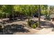 Well-maintained entrance featuring lush landscaping and inviting signage for residents and visitors at 1701 E Colter St # 147, Phoenix, AZ 85016