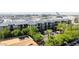 Multi-story condominium with landscaped grounds, pool, and easy access to city amenities at 1701 E Colter St # 147, Phoenix, AZ 85016