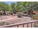 Scenic backyard offering plenty of shade, desert landscape, patio furniture and lots of walking paths at 17349 E Quail Ridge Dr, Fountain Hills, AZ 85268