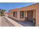 Desert-style home with well-maintained landscaping, a tile roof and a secure front door at 17349 E Quail Ridge Dr, Fountain Hills, AZ 85268