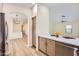 Bright kitchen with stainless steel appliances, white countertops, and seamless access to the living room at 17349 E Quail Ridge Dr, Fountain Hills, AZ 85268