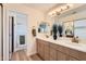 Inviting bathroom with double vanity, ample storage space, modern fixtures and a glass enclosed walk-in shower at 17349 E Quail Ridge Dr, Fountain Hills, AZ 85268
