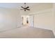 Spacious bedroom with an open doorway and carpeted floors at 17349 E Quail Ridge Dr, Fountain Hills, AZ 85268