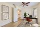 Functional home office with a sleek desk, comfortable chair, and ample natural light at 17349 E Quail Ridge Dr, Fountain Hills, AZ 85268