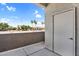 View from the outdoor balcony with a view of the street and storage closet at 1941 S Pierpont Dr # 1014, Mesa, AZ 85206