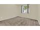 Bedroom with neutral walls, base trim, carpet, and a window with blinds at 1941 S Pierpont Dr # 1014, Mesa, AZ 85206