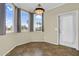 Charming dining nook featuring tiled floors, decorative lighting, and bright windows with neighborhood views at 1941 S Pierpont Dr # 1014, Mesa, AZ 85206