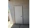 Exterior of home featuring a beige stucco wall and a door at 1941 S Pierpont Dr # 1014, Mesa, AZ 85206