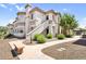 Attractive stucco condo building featuring private entrances, desert landscaping, and shaded parking at 1941 S Pierpont Dr # 1014, Mesa, AZ 85206