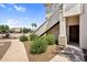 Exterior of the building with tidy landscaping and pathway, offering a welcoming outdoor environment at 1941 S Pierpont Dr # 1014, Mesa, AZ 85206