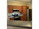 Contemporary kitchen featuring stainless steel appliances and sleek countertops at 1941 S Pierpont Dr # 1014, Mesa, AZ 85206
