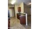 Functional kitchen with tile floors and an eat-in bar at 1941 S Pierpont Dr # 1014, Mesa, AZ 85206