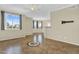 Inviting living space featuring tiled flooring, decorative inlays, and access to a dining nook and patio at 1941 S Pierpont Dr # 1014, Mesa, AZ 85206