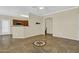 Bright living room featuring tile floors with decorative compass, flowing natural light, and contemporary design at 1941 S Pierpont Dr # 1014, Mesa, AZ 85206