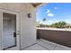 Private patio with views of the community and palm trees, providing a serene outdoor experience at 1941 S Pierpont Dr # 1014, Mesa, AZ 85206