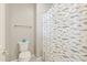 Cozy bathroom with toilet and a patterned shower curtain at 1941 W Yellowstone Way, Chandler, AZ 85248