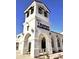 Attractive building is home to Trophy Sports, Cars and Spirits featuring an arched portico and tower at 1941 W Yellowstone Way, Chandler, AZ 85248