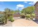 Backyard landscaping features desert plants and gravel at 19550 N Grayhawk Dr # 1144, Scottsdale, AZ 85255