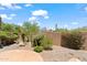 Landscaped backyard with desert plants and gravel at 19550 N Grayhawk Dr # 1144, Scottsdale, AZ 85255