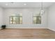 Bright and airy living area with lots of windows and stylish wood flooring at 19550 N Grayhawk Dr # 1144, Scottsdale, AZ 85255