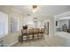 Bright open kitchen with a breakfast bar, stainless steel appliances, and light countertops at 2041 E Des Moines St, Mesa, AZ 85213