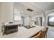Modern kitchen with a stainless steel refrigerator, white countertops, and stylish accents at 2041 E Des Moines St, Mesa, AZ 85213