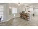 View of kitchen and breakfast nook with bar stool seating at 2041 E Des Moines St, Mesa, AZ 85213