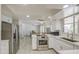 Spacious kitchen featuring modern appliances, sleek countertops, and an open floor plan at 2041 E Des Moines St, Mesa, AZ 85213