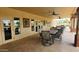 Enjoy community gatherings in the covered outdoor seating area with ceiling fans at 2101 S Meridian Rd # 437, Apache Junction, AZ 85120