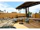 Inviting outdoor space with a fire pit and comfortable seating, perfect for enjoying evenings in the backyard at 21609 N 61St Ave, Glendale, AZ 85308