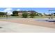Well-maintained community basketball court with a mountain backdrop, surrounded by green space and neighborhood residences at 21609 N 61St Ave, Glendale, AZ 85308