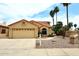 Charming single-Gathering home with a two-car garage, palm trees, and drought-resistant landscaping at 21609 N 61St Ave, Glendale, AZ 85308