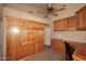Home office with a built-in murphy bed and custom cabinetry offers flexibility at 21609 N 61St Ave, Glendale, AZ 85308