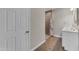 Bathroom featuring a shower with tile surround, vanity, and light fixtures at 2215 W Highland Ave, Phoenix, AZ 85015
