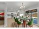 Dining room area with sliding glass doors and modern furnishings at 2215 W Highland Ave, Phoenix, AZ 85015