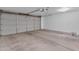 Spacious two-car garage featuring a wide garage door and ample space for parking and storage at 2215 W Highland Ave, Phoenix, AZ 85015