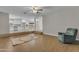 Spacious living room with light wood flooring and an open floor plan at 2215 W Highland Ave, Phoenix, AZ 85015