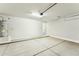 Spacious garage with concrete floor, water heater, overhead door and room for parking at 22351 S Manzanilla Rd, Buckeye, AZ 85326