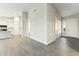 Open-concept living space featuring sleek flooring and bright, neutral-toned walls at 22351 S Manzanilla Rd, Buckeye, AZ 85326