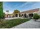 Spacious backyard featuring a well-manicured lawn, a refreshing pool, and a covered patio for relaxation and outdoor activities at 2330 E Stephens Pl, Chandler, AZ 85225