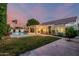 Expansive backyard with a covered patio, well-maintained lawn, and a refreshing pool, ideal for relaxing and entertaining at 2330 E Stephens Pl, Chandler, AZ 85225