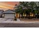 Charming single-story home with a two-car garage and well-manicured landscaping at 2330 E Stephens Pl, Chandler, AZ 85225