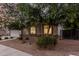 Well-maintained home featuring low-maintenance landscaping, mature trees, and stone accents at 2330 E Stephens Pl, Chandler, AZ 85225