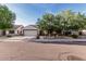 Charming single-Gathering home featuring a spacious driveway and well-manicured landscaping at 2330 E Stephens Pl, Chandler, AZ 85225